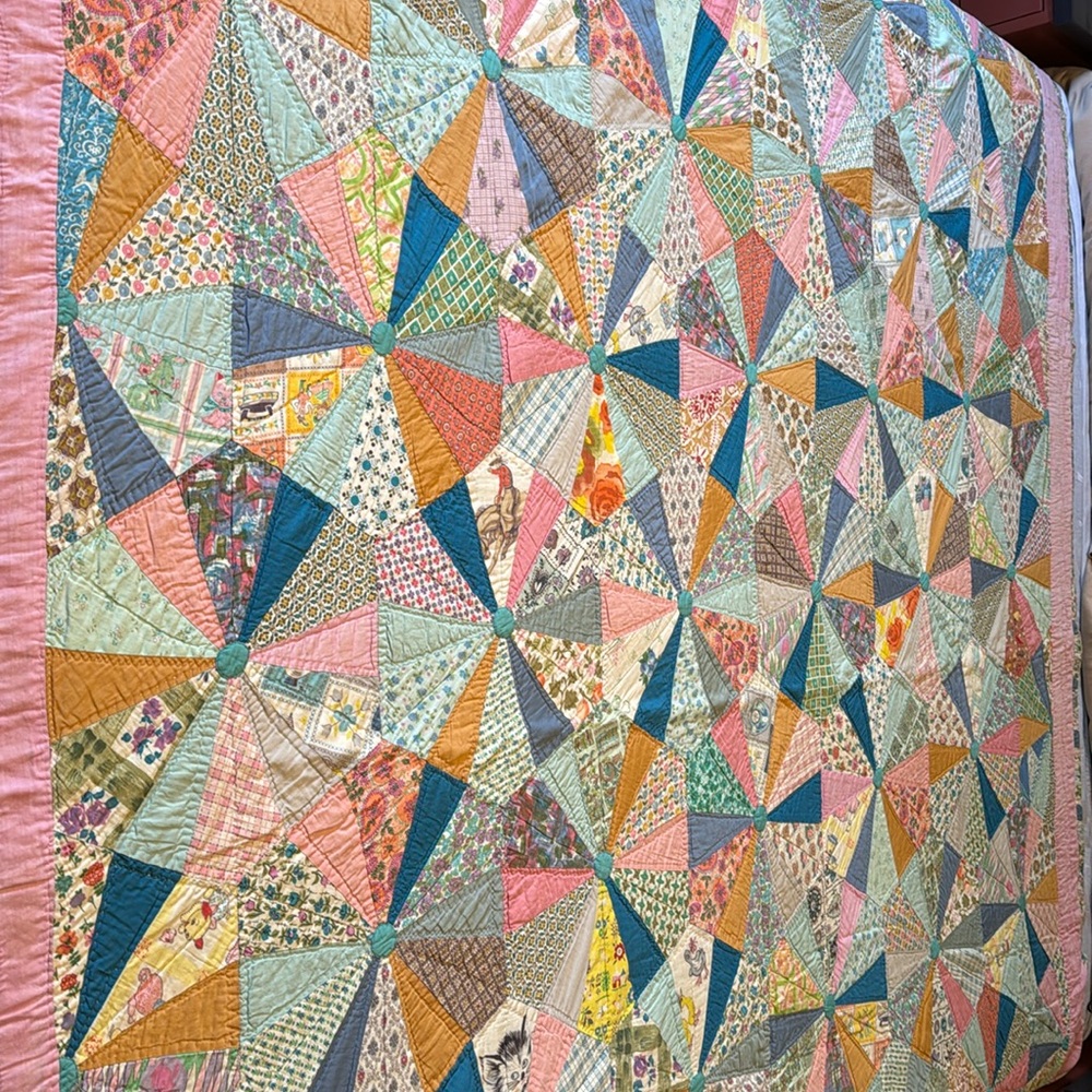 A true gem, this vintage quilt. Great condition for its age. Size 68 by 90.